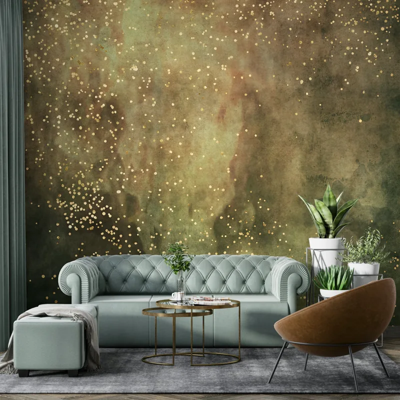 Green watercolor mural with gold glitter accents
